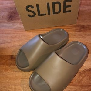 The New Yeezy Slides Are Introduced in Earth Brown.